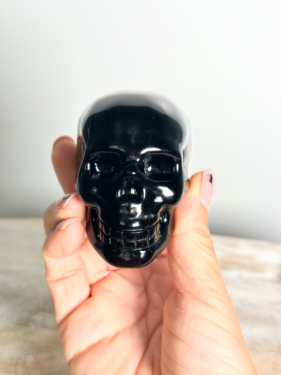 Gold Obsidian Skull Carving