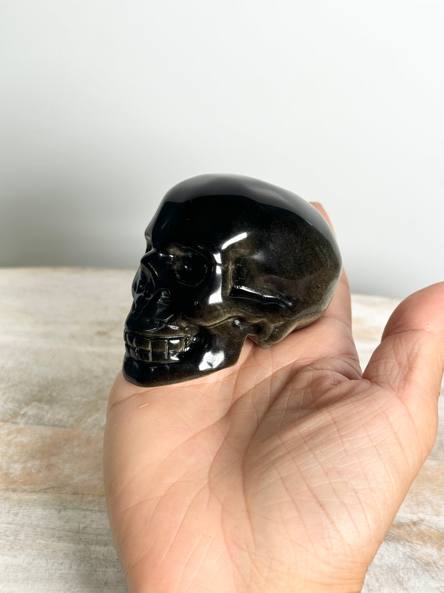 Gold Obsidian Skull Carving