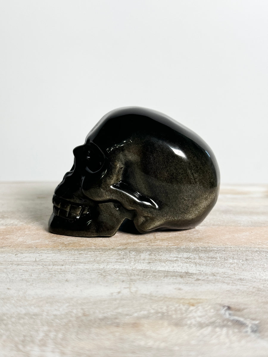 Gold Obsidian Skull Carving