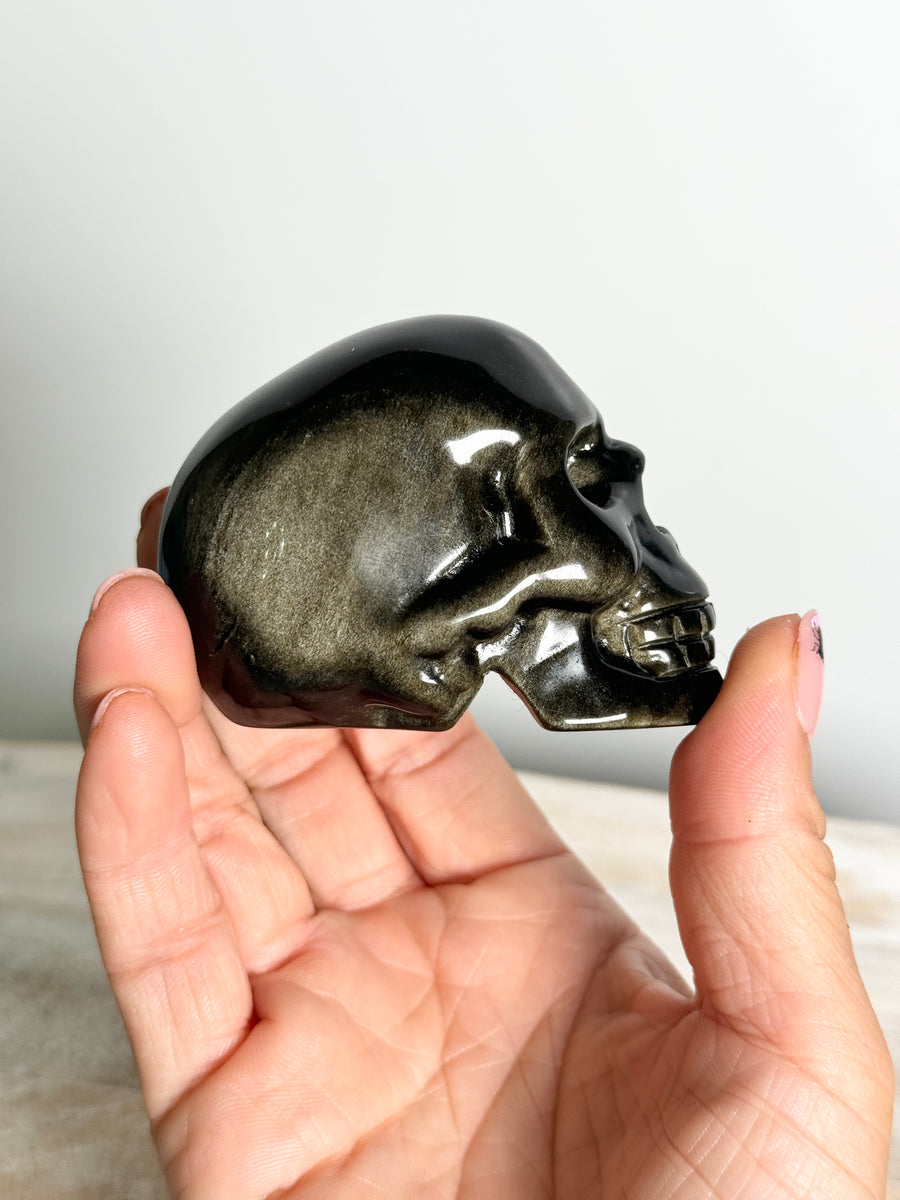 Gold Obsidian Skull Carving