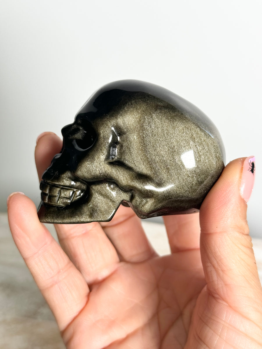 Gold Obsidian Skull Carving