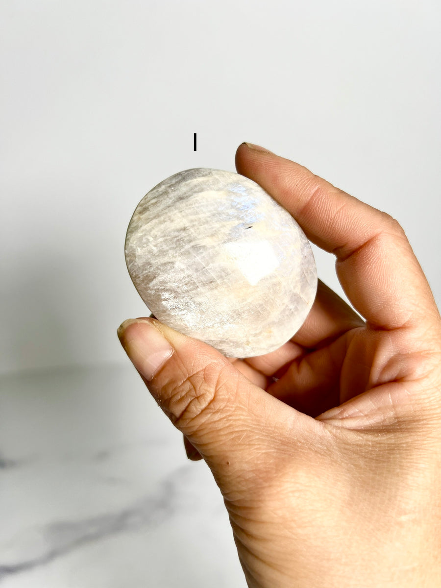 Sunstone in Moonstone Palm Stone