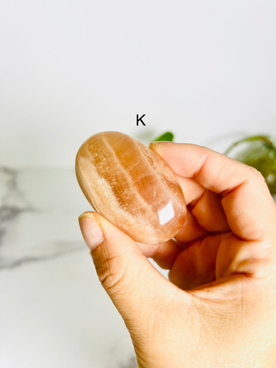 Honey Calcite Palm Stone