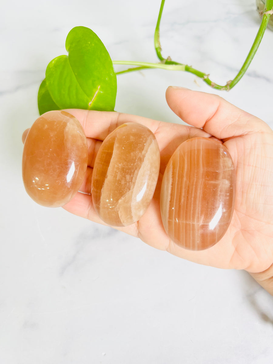 Honey Calcite Palm Stone