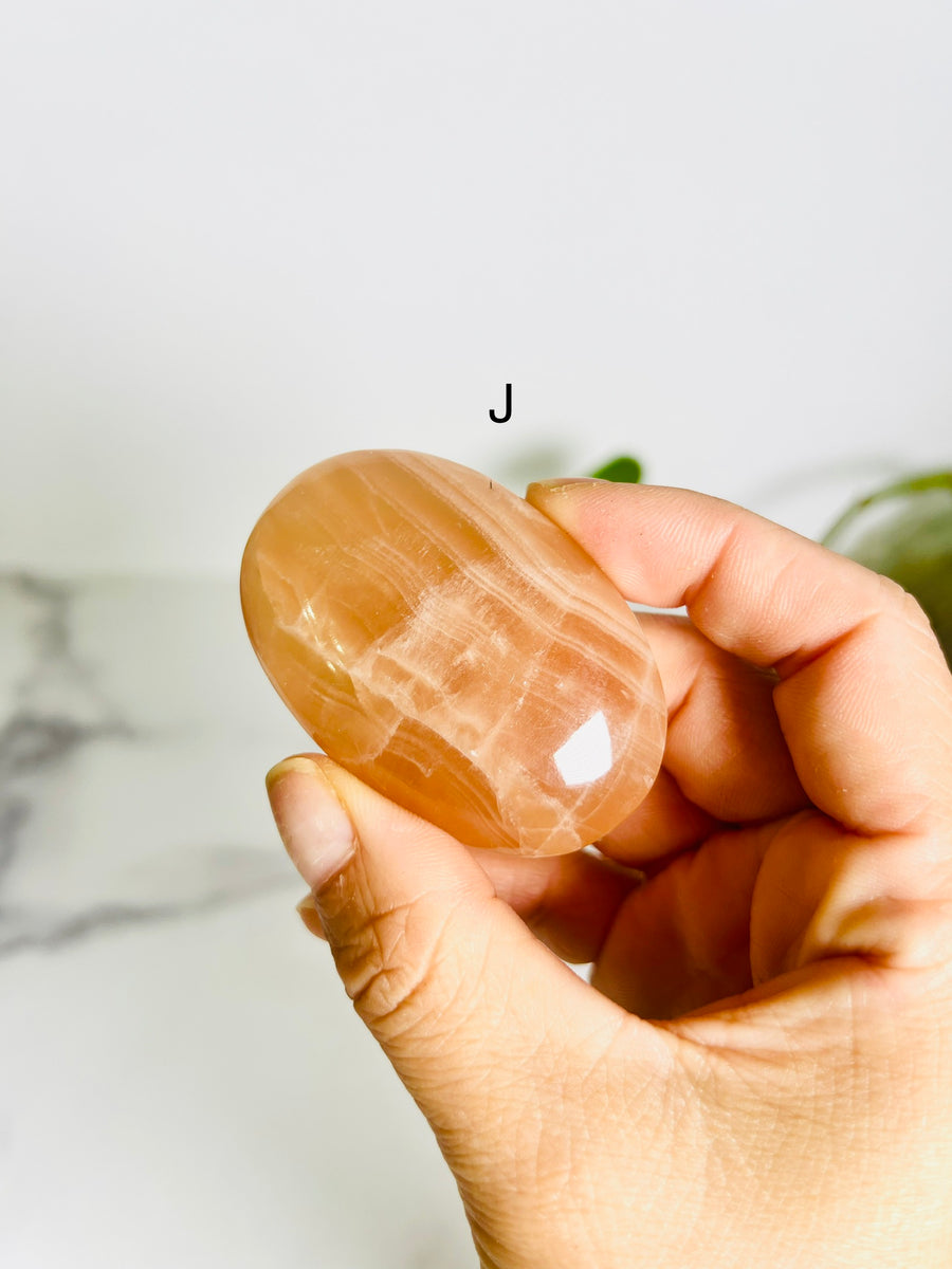 Honey Calcite Palm Stone